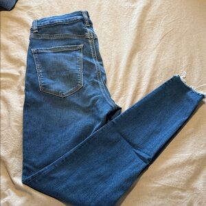 American Eagle Outfitters Dark Blue Skinny Jeans with Frayed Hem
